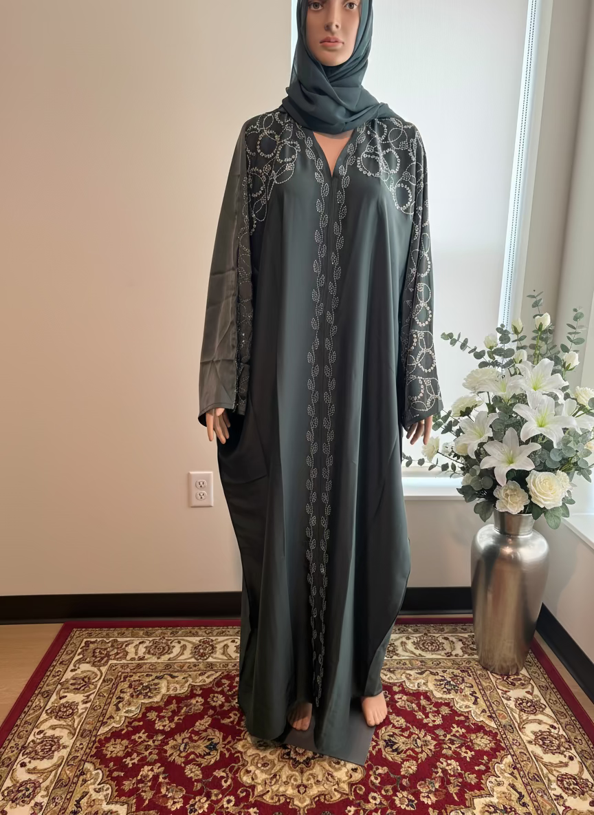 Closed Green Satin Abaya, crafted from luxurious satin fabric